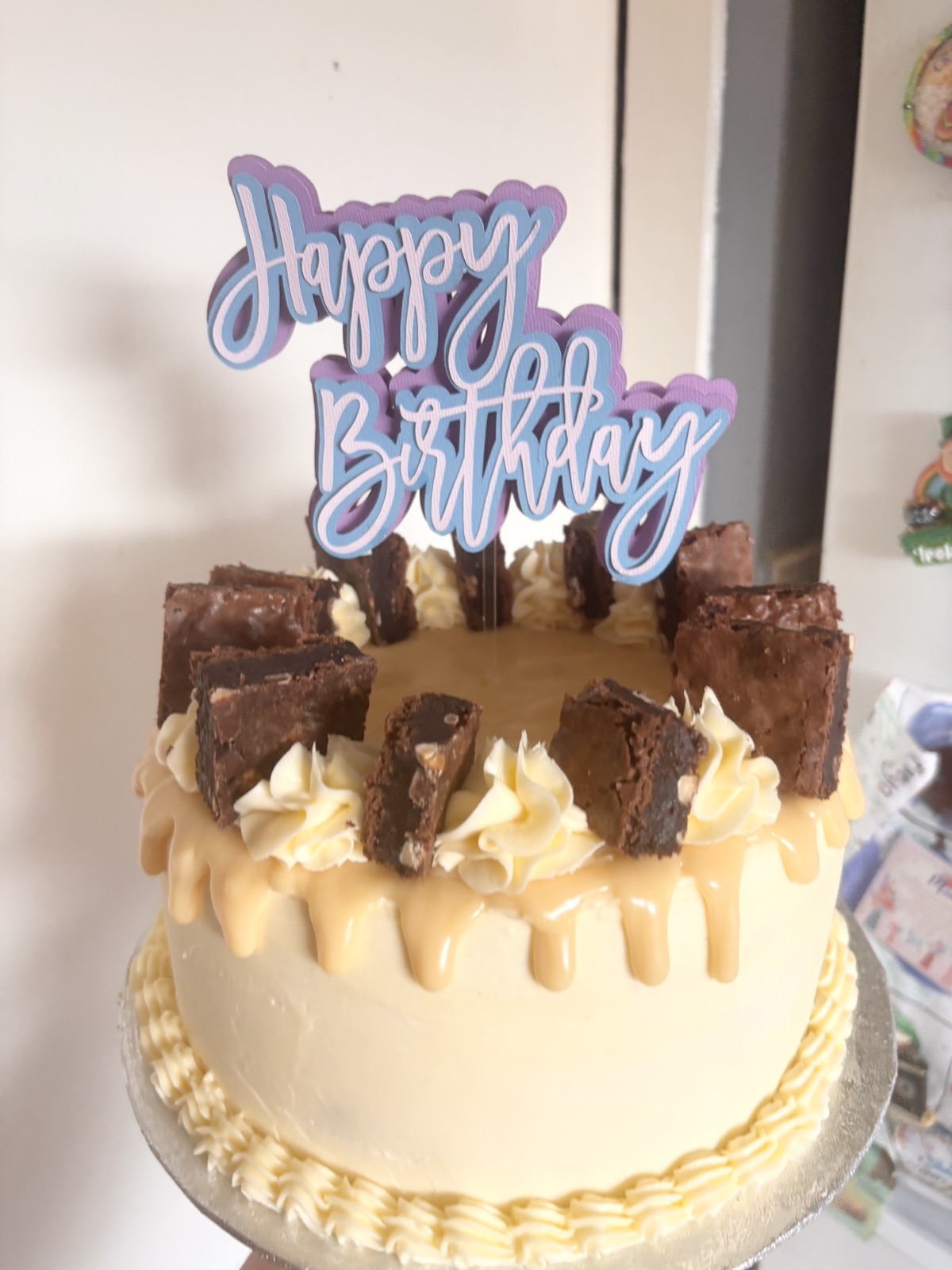Brownie drip birthday cake made by Bad Boss Bakes